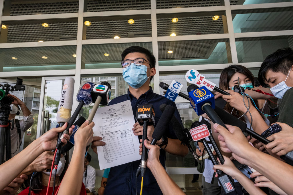 Hong Kong banned 12 pro-democracy activists from Election